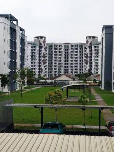 a view of a large apartment building with a park at 3 Bedroom Apartment with Pool and Beautiful View in Klebang, Ipoh in Chemor