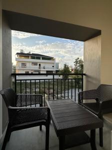 Un balcon sau o terasă la SanTrupthi - A 3bhk Stay at Home