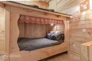 Chalet Le Bois Joli客房内的一张或多张床位