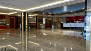 a lobby with a reception desk in a building at Kenting Southern Dream Resort in Kenting