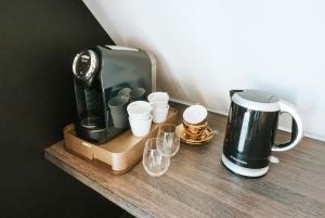 Kaffe- og tefaciliteter på Texels Goud Deluxe Suites + 17 billeder