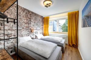 Ένα ή περισσότερα κρεβάτια σε δωμάτιο στο Luxusapartment, Rüttenscheid, zwei Parkplätze +18 φωτογραφίες