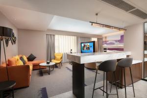 Televiisor ja/või meelelahutuskeskus majutusasutuses Hampton by Hilton Foshan Dali
