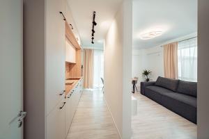 O zonă de relaxare la LUXURY Cozy Apartments and Studios Palas Mall Iasi