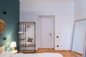 Postel nebo postele na pokoji v ubytování Gallery Hostel Tbilisi