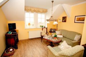 TV a/nebo společenská místnost v ubytování Hotel/Pension Bradhering + 13 fotografií