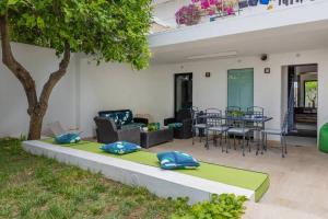 a living room with a couch and a table at Lemon House, Capri in Capri
