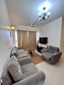 Posezení v ubytování TATA Rio De Goa, Good Stay 2 BHK Pool View Premium Apartment, 805