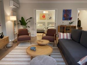 a living room with a couch and a table at Spacious luxury flat in the heart of Istanbul in Istanbul
