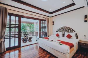 Postel nebo postele na pokoji v ubytování Havana Beach Resort Phangan