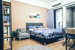 谷園酒店公寓Good Garden Apartment房間的床