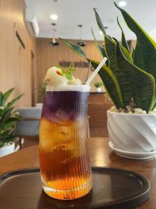 a drink sitting on top of a table at Hung Vuong Hotel in Quang Ngai