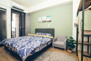 谷園酒店公寓Good Garden Apartment房間的床