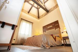 Letto o letti in una camera di Borgo Antico XIX sec.