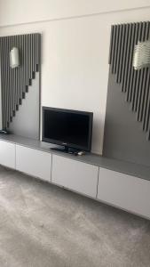 TV in/ali zabaviščno središče v nastanitvi Hotel Parc
