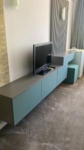 TV in/ali zabaviščno središče v nastanitvi Hotel Parc