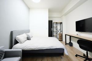 谷園酒店公寓Good Garden Apartment電視和／或娛樂中心