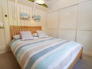 מיטה או מיטות בחדר ב-Niwl-y-Mynydd
