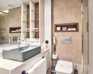 A bathroom at Mediterranean Hotel