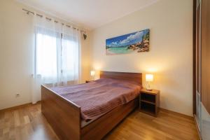 Katil atau katil-katil dalam bilik di Apartament 4 Pory Roku basen sauna 200m plaża +5 gambar