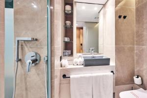 A bathroom at Mediterranean Hotel