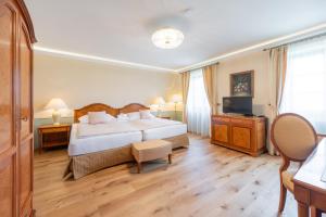 Posteľ alebo postele v izbe v ubytovaní Zámeček - Chateau Lány - Depandance Stroodel