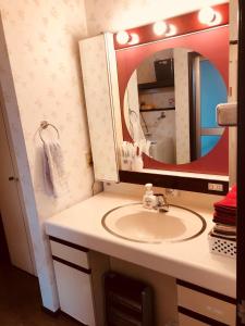 a bathroom with a sink and a mirror at homelike / Vacation STAY 33817 in Chiba
