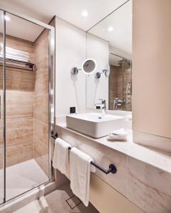 A bathroom at Mediterranean Hotel