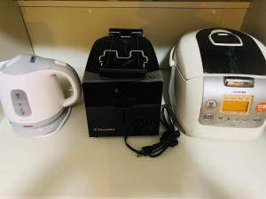 a hair dryer and a toaster on a table at Maisonette Hanazono - Vacation STAY 97278v in Chiba