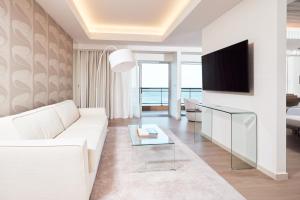 A television and/or entertainment centre at Mediterranean Hotel