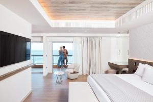 A television and/or entertainment centre at Mediterranean Hotel