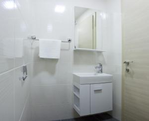 Ein Badezimmer in der Unterkunft Apartments Diamond