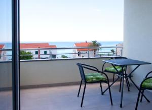 Ein Balkon oder eine Terrasse in der Unterkunft Apartments Diamond