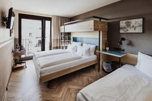 Postel nebo postele na pokoji v ubytování Emma by Schulz Hotel Berlin Friedrichshain + 37 fotografií