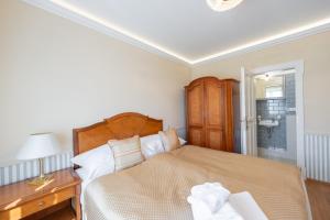 Posteľ alebo postele v izbe v ubytovaní Zámeček - Chateau Lány - Depandance Stroodel