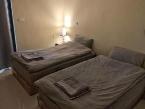 Postel nebo postele na pokoji v ubytování White Cat B&B
