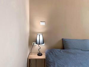 Postel nebo postele na pokoji v ubytování White Cat B&B