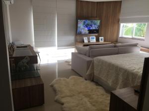 Μια τηλεόραση ή/και κέντρο ψυχαγωγίας στο ResidencialCollins casa 788