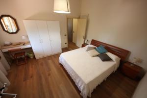 Кровать или кровати в номере Affittacamere Acquaria-Vinci