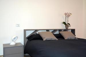 Postel nebo postele na pokoji v ubytování inStile aparthotel