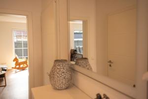 Fotografie z fotogalerie ubytování Haus Friesenkuss mit Hund v destinaci Wangerland + 41 fotografií