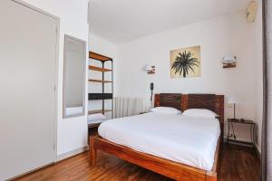 Postel nebo postele na pokoji v ubytování Hôtel François d'O