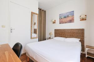 Postel nebo postele na pokoji v ubytování Hôtel François d'O