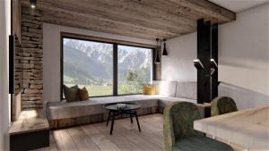 a room with a bench and a large window at Apartment Gosauschmied in Gosau