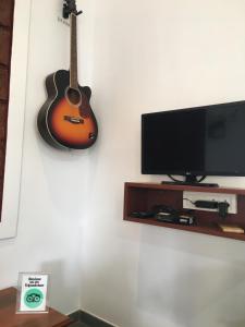 TV o dispositivi per l'intrattenimento presso MARS Jungle Adventure Stud Farm with Private Jacuzzi
