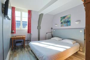 Postel nebo postele na pokoji v ubytování Hôtel François d'O