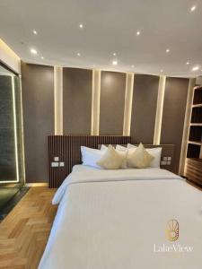 Кровать или кровати в номере Executive Suite Apartment in Cape Coast - Lakeview by Agnes