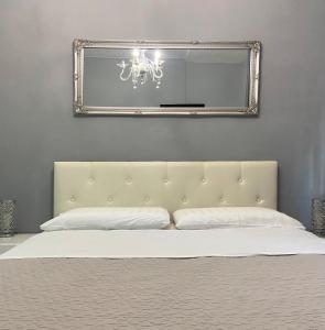 Postel nebo postele na pokoji v ubytování Casa Rosmini rooms, Dolomia best home