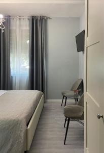 Postel nebo postele na pokoji v ubytování Casa Rosmini rooms, Dolomia best home