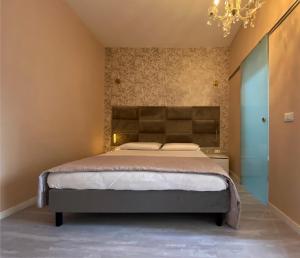 Postel nebo postele na pokoji v ubytování Casa Rosmini rooms, Dolomia best home